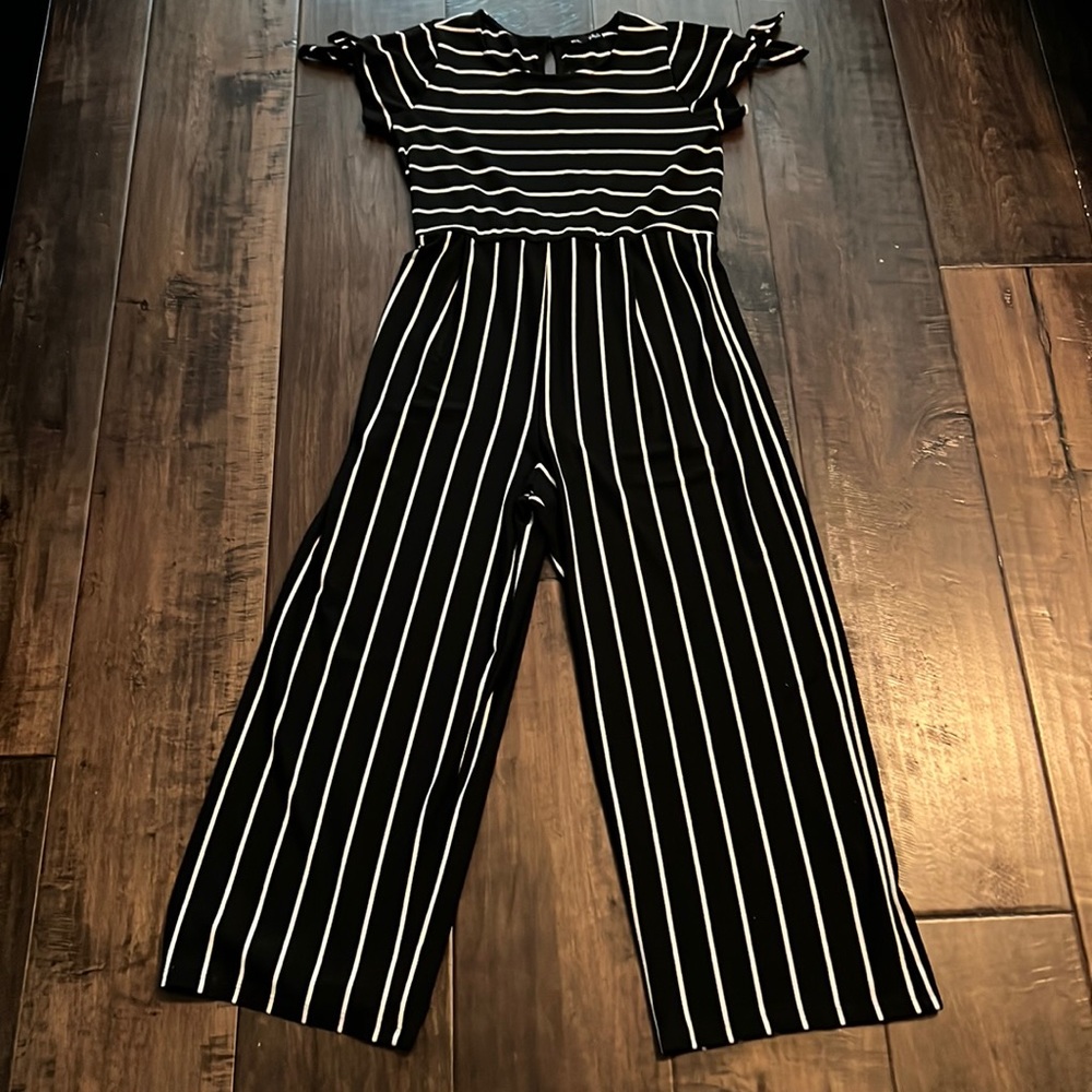 Cute little striped jumpsuit. It has never been worn.